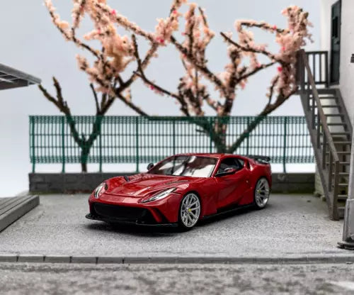 Red racing sports car diecast model, 1:64 scale