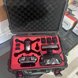 Hard-shell drone case with foam inserts and FPV drone accessories