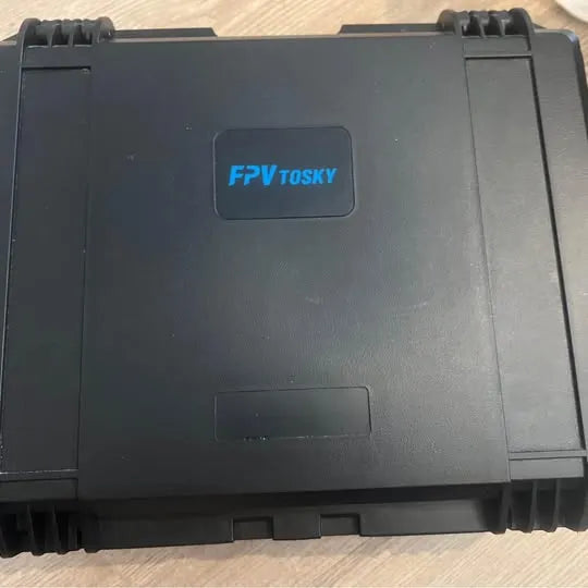 Black hard protective drone case with molded foam edges and latch