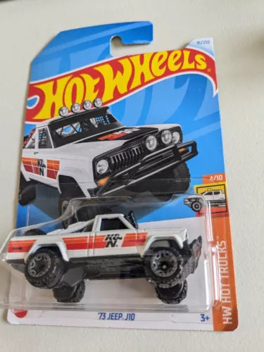White and orange off-road pickup diecast toy car with black grille