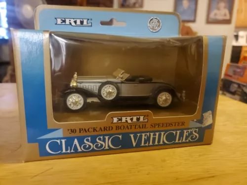Classic diecast speedster car model in ERTL retail box, dark with silver wheels