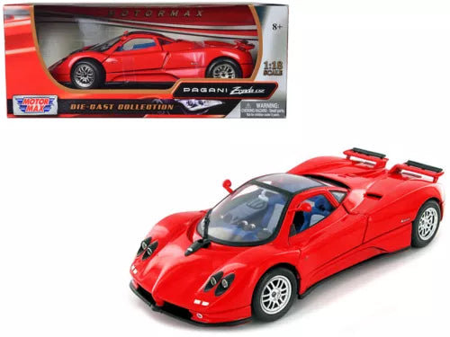 Red diecast model sports car, front 3/4 view with rear wing