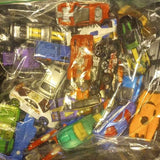 Loose Hotwheels diecast vehicles multipack, various colored cars in clear bag
