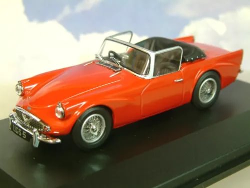 1/43 diecast model car, red sports car with hood down, front three-quarter view