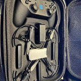 Drone carrying case interior with compact quadcopter and controller grips
