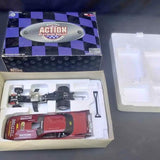 Red NHRA funny car diecast model with car stand, in open Action Platinum Series box
