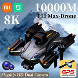 Black quadcopter drone with dual camera gimbal and orange accents