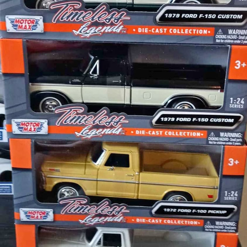 Die-cast Ford pickup truck models in retail box, black and yellow.