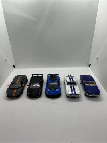 Set of five 1:36 diecast toy cars, assorted colors in a display tray