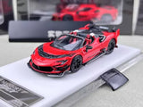 Red convertible sports diecast model car with black wheels and rear spoiler