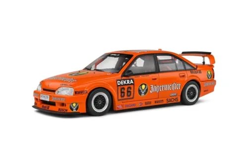 1:18 diecast race car model, orange with black wheels and racing decals