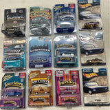 Lowrider diecast car in clear blister package, multiple boxed cars