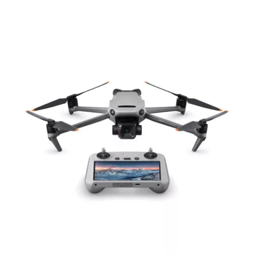 Grey quadcopter drone with propellers and remote controller with screen