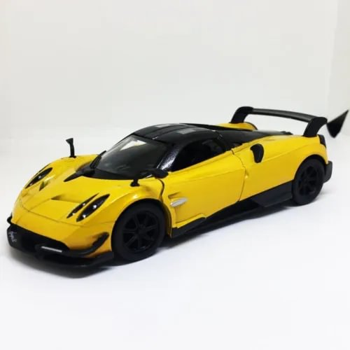 Diecast sports car model with yellow body and black accents, open cockpit