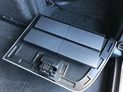 Diecast car model display tray with light grey panel and molded compartments