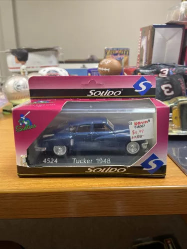 Navy blue Tucker 1948 metal diecast car model in retail box, number 4524