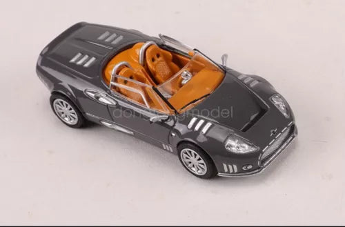 Dark gray 1/64 scale diecast sports car with orange interior detail