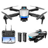 Foldable mini quadcopter drone with front camera, blue lights, and handheld remote