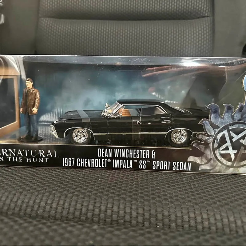 Black diecast 1967 Chevrolet Impala SS sport sedan with Dean Winchester figure in box