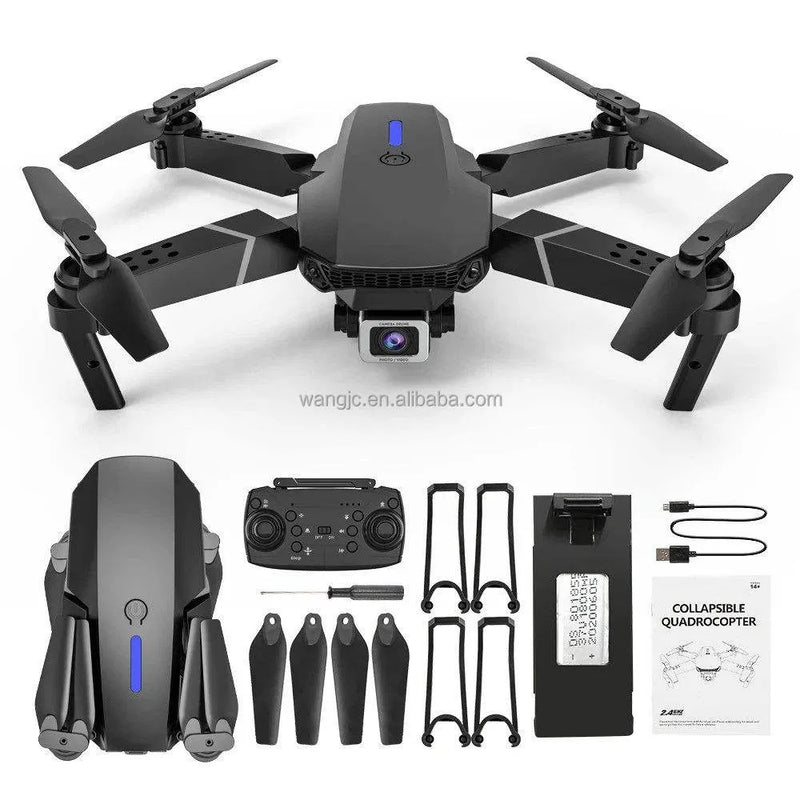 Quadcopter RC drone with built-in camera, dark gray body and four foldable propellers