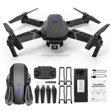 Quadcopter RC drone with built-in camera, dark gray body and four foldable propellers