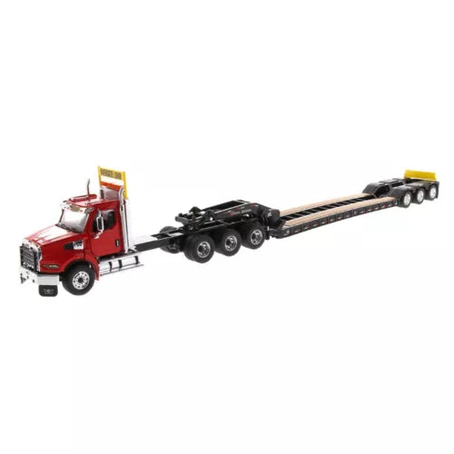 Red diecast truck with black flatbed trailer and multiple wheels