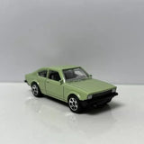 Light green 1975 Opel Kadett coupe diecast model, front 3/4 view