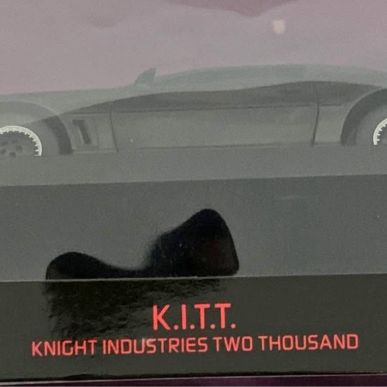 Diecast K.I.T.T. car front with red KITT and Knight Industries lettering
