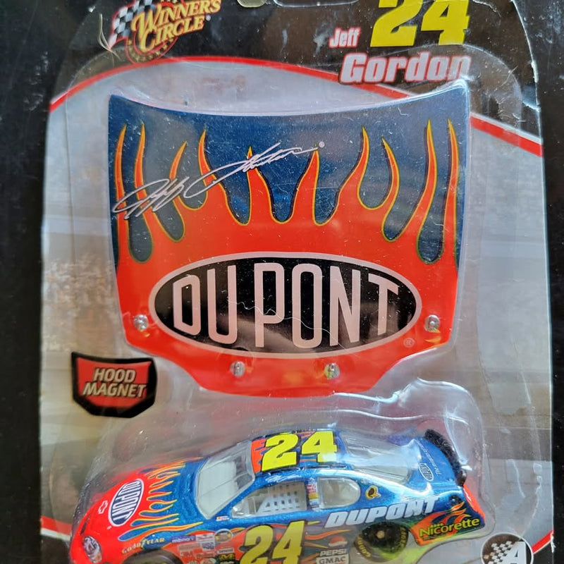 Diecast race car in package, red flame graphics and Dupont logo, #24