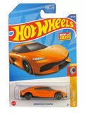 Hot Wheels diecast car, orange Koenigsegg Gemera in blister pack