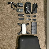 Drone kit set with quadcopter, controller, propellers and charging accessories