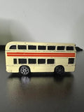 Cream double-decker sightseeing bus diecast model, side view