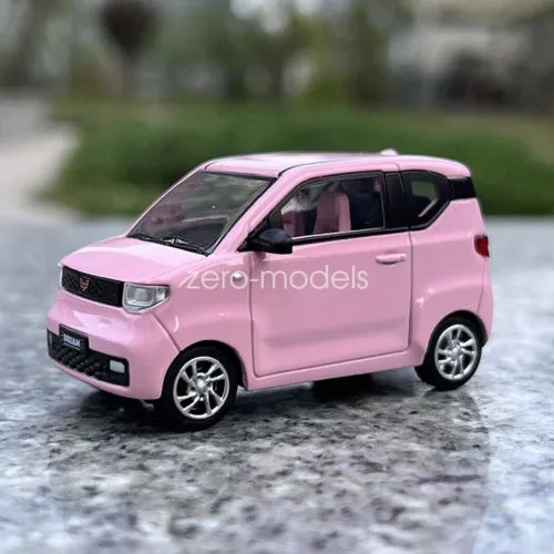 1/64 scale pink Wuling MiNi EV diecast car model, front 3/4 view
