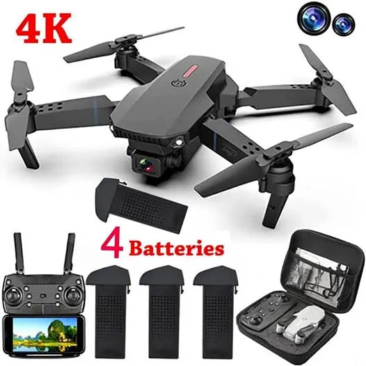 Drone kit with four batteries, controller screen, and camera case; gray quadcopter