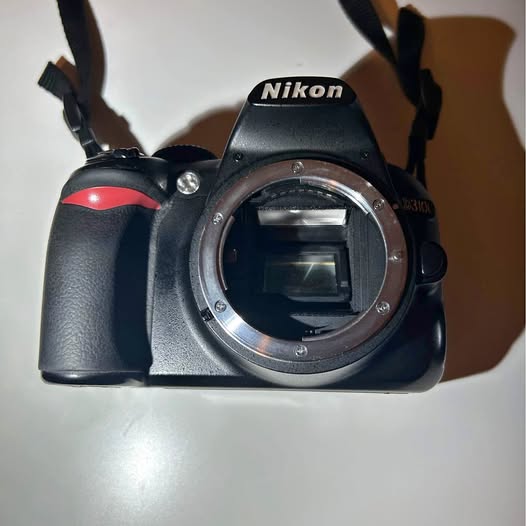 Nikon DSLR camera body with lens mount and viewfinder