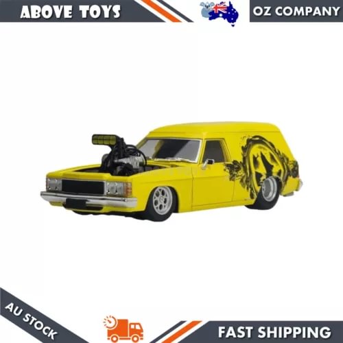 1:24 scale yellow diecast panel van with black hood and wheel details, front view