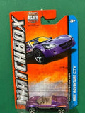 Matchbox 1/64 purple Opel Speedster diecast on card with blister packaging