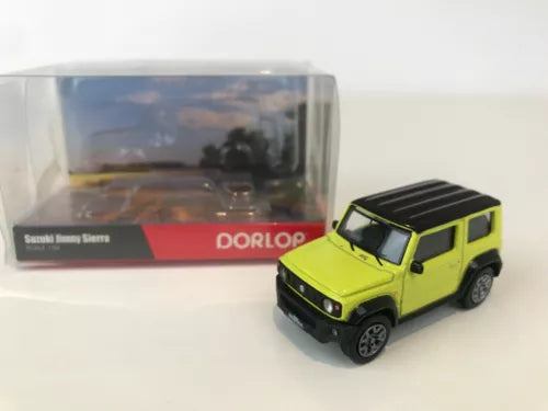 Yellow diecast Suzuki Jimny Sierra model SUV, front three-quarter view with black grille