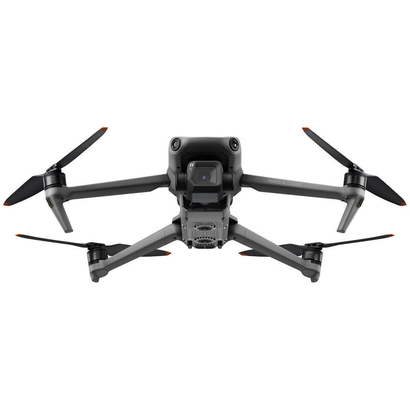 Black quadcopter drone with front camera and four propeller arms