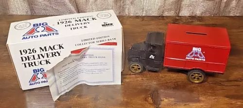 1926 Mack delivery truck diecast coin bank with red box, gray cab, and packaging