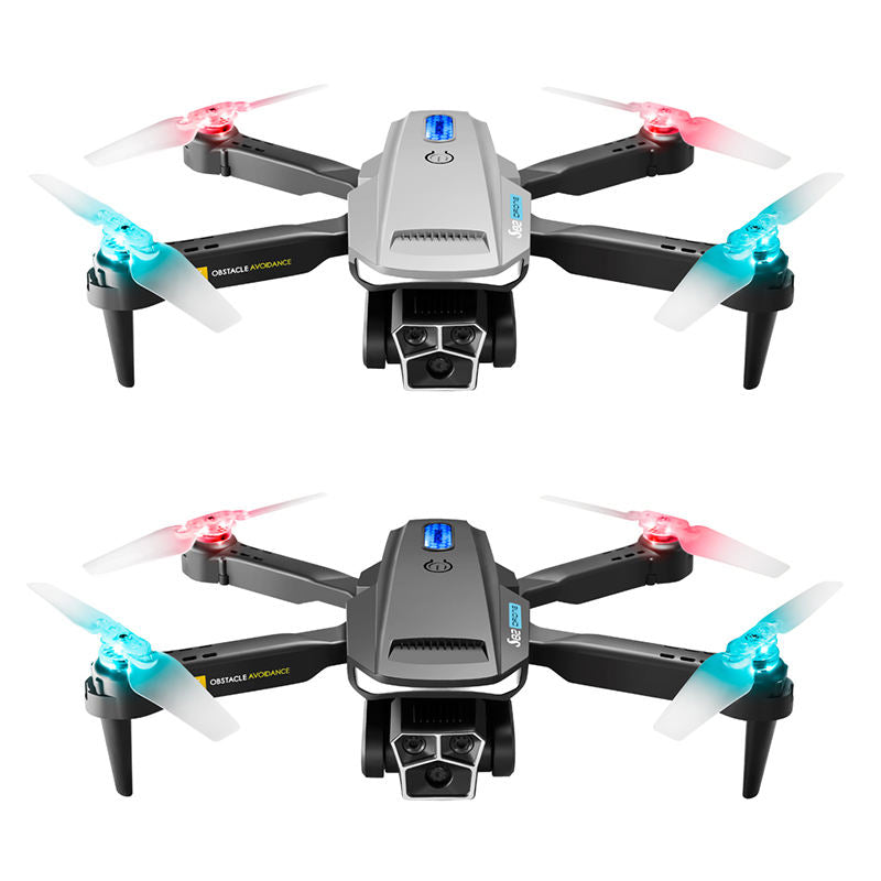 Quadcopter drone with four propellers, front camera, and gray body