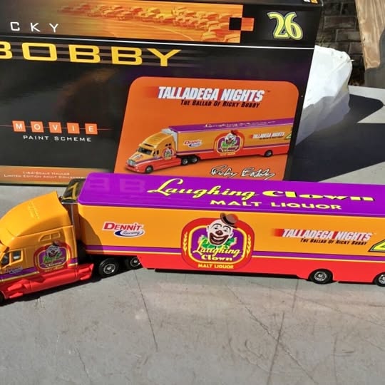 Laughing clown diecast vehicles: orange truck and red bus with graphics