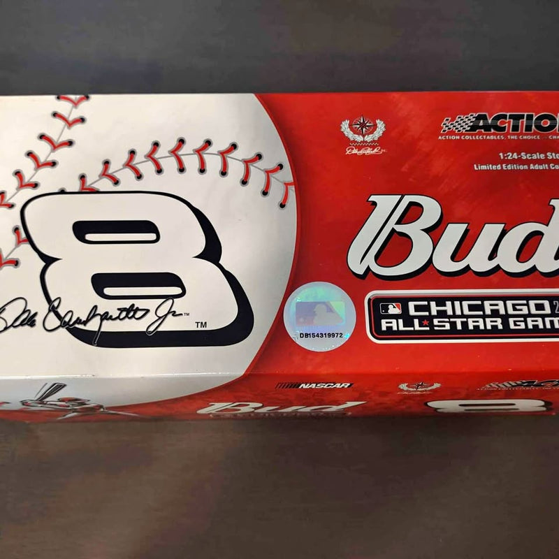 1:24 scale diecast racing car with red and white body and Bud logo