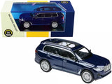 BMW X7 diecast model car, tanzanite blue metallic SUV with detailed wheels