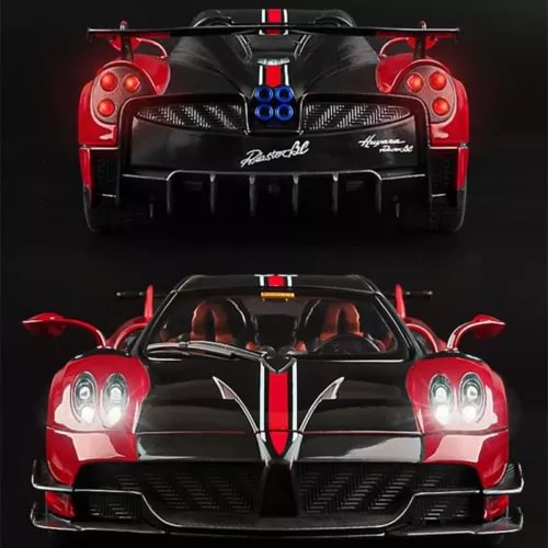 Diecast sports car model with red and black front fascia, headlights, and rear wing