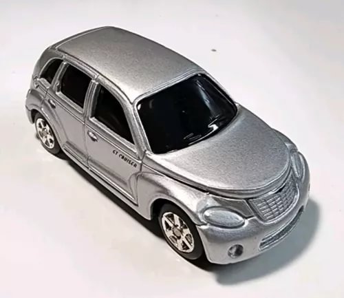 Silver 2000 PT Cruiser diecast car with black windows and chrome details