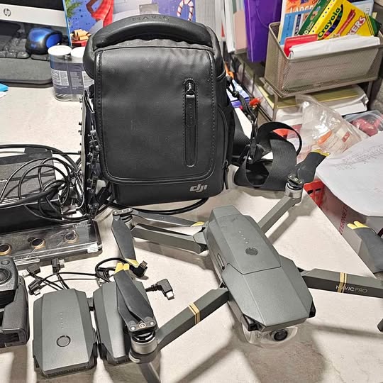 DJI Mavic Pro drone black carrying case with DJI logo and drone parts