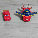Red diecast car and red Mater flight vehicle with blue wings