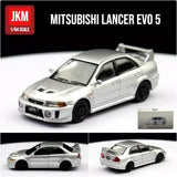 Silver Mitsubishi Lancer Evo 5 diecast model car, 1/64 scale, front 3/4 view