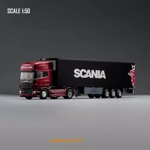 Red diecast Scania semi-truck with black container trailer, front cab and wheels
